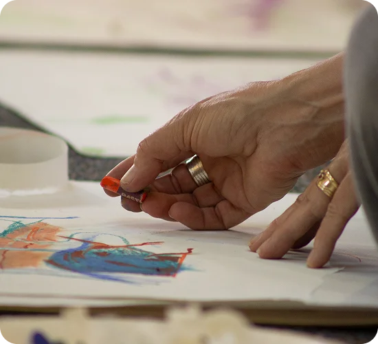 Hands exploring colour and texture during an online Sensory Awareness workshop